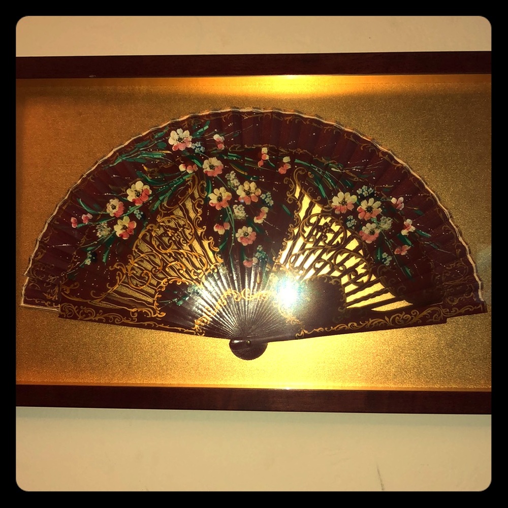 Beautiful fan cased in frame.